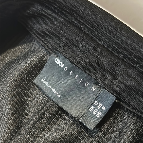 ASOS Black Jumpsuit with Wide-Leg Pants and V-Neck. Button front. Open back. 8 - Picture 8 of 12